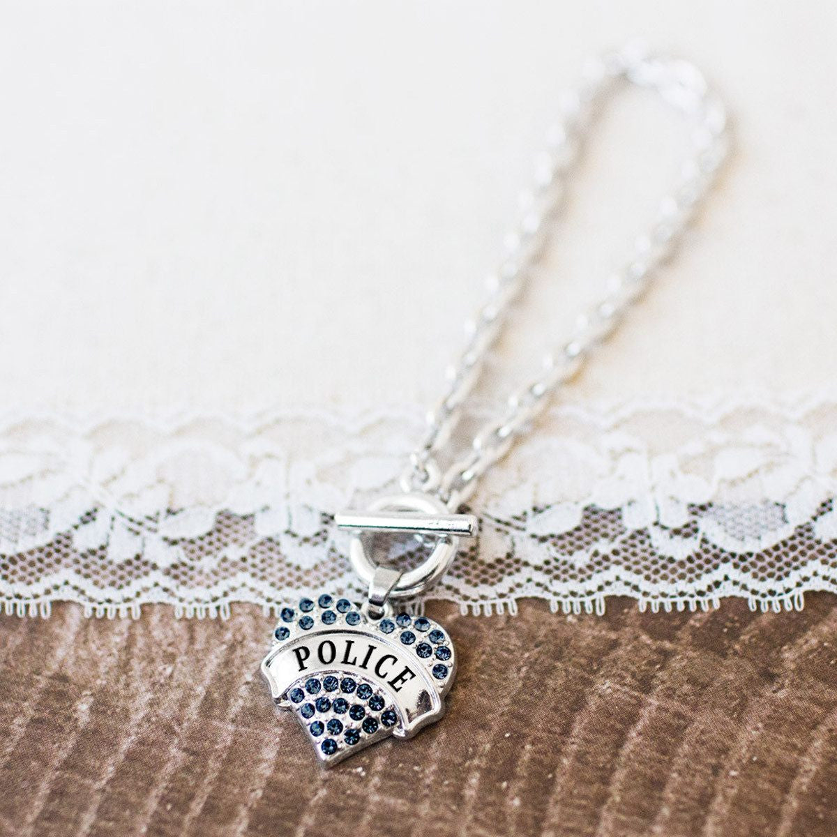 Police Pave Heart Charm Jewelry Collection
