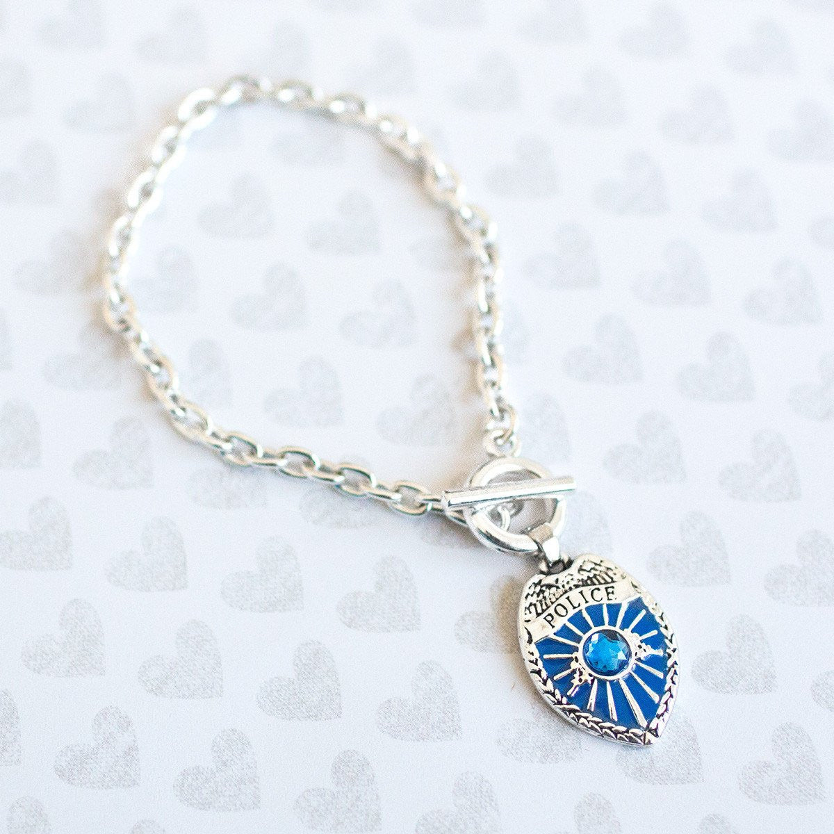 Blue Police Badge Charm Jewelry Collection